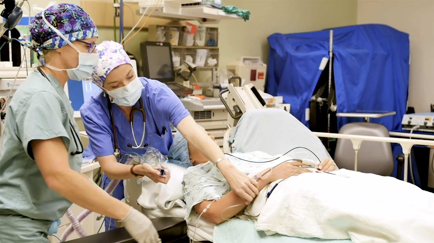 nurses helping a patient